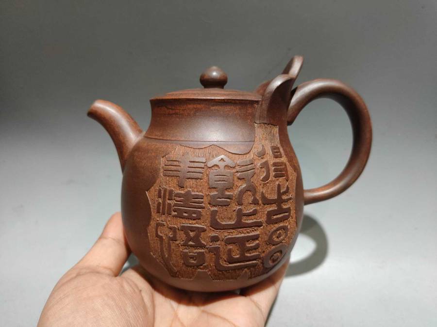 柴烧窑变僧帽壶 泥料：原矿红泥的来源图片