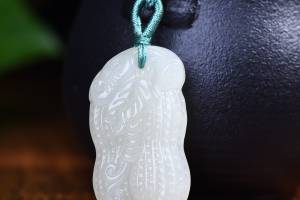 附鉴定证书 和田玉《吉祥花生》的来源图片